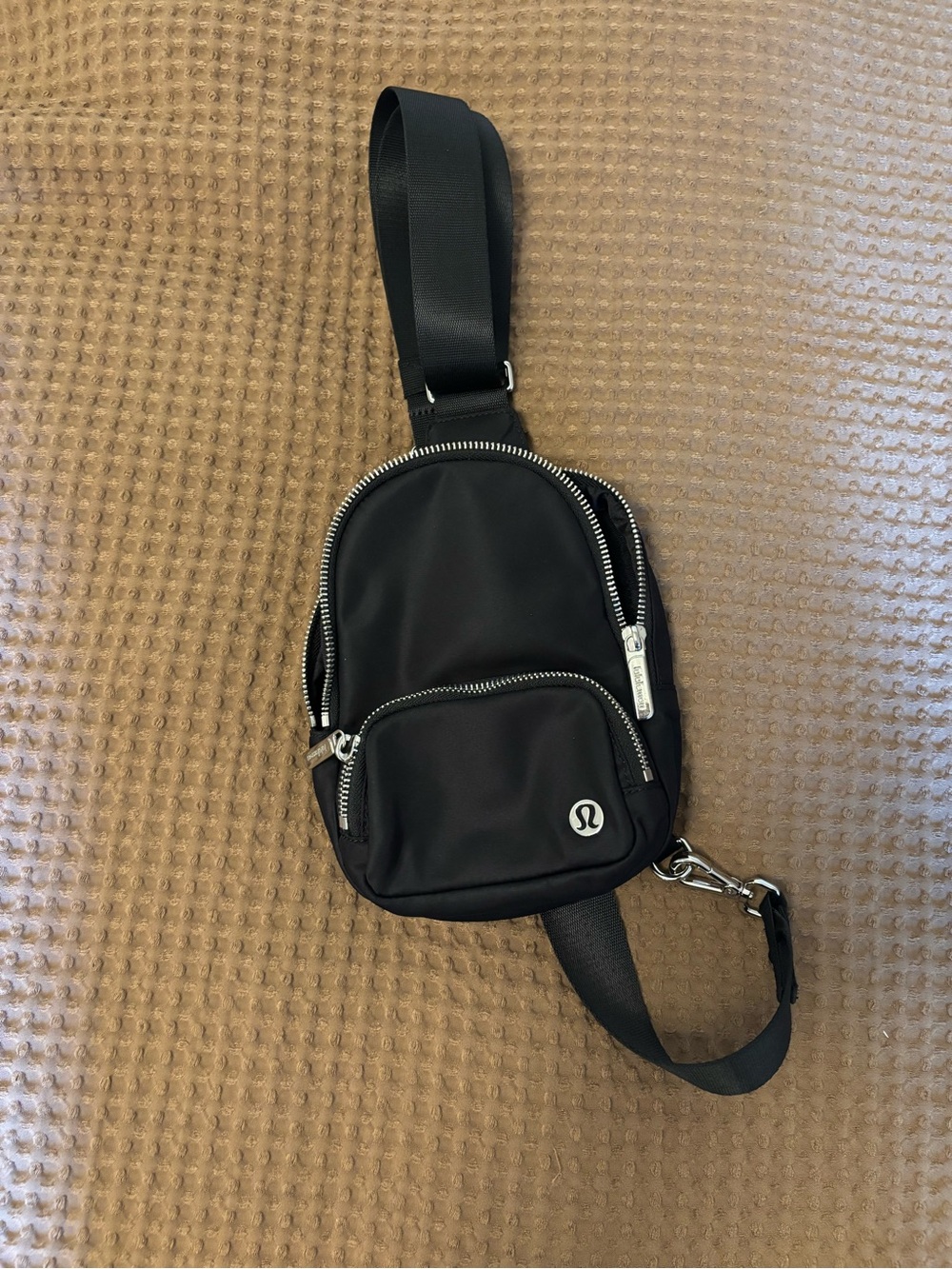 lululemon athletica Black Mini Sling Bag with Silver Hardware